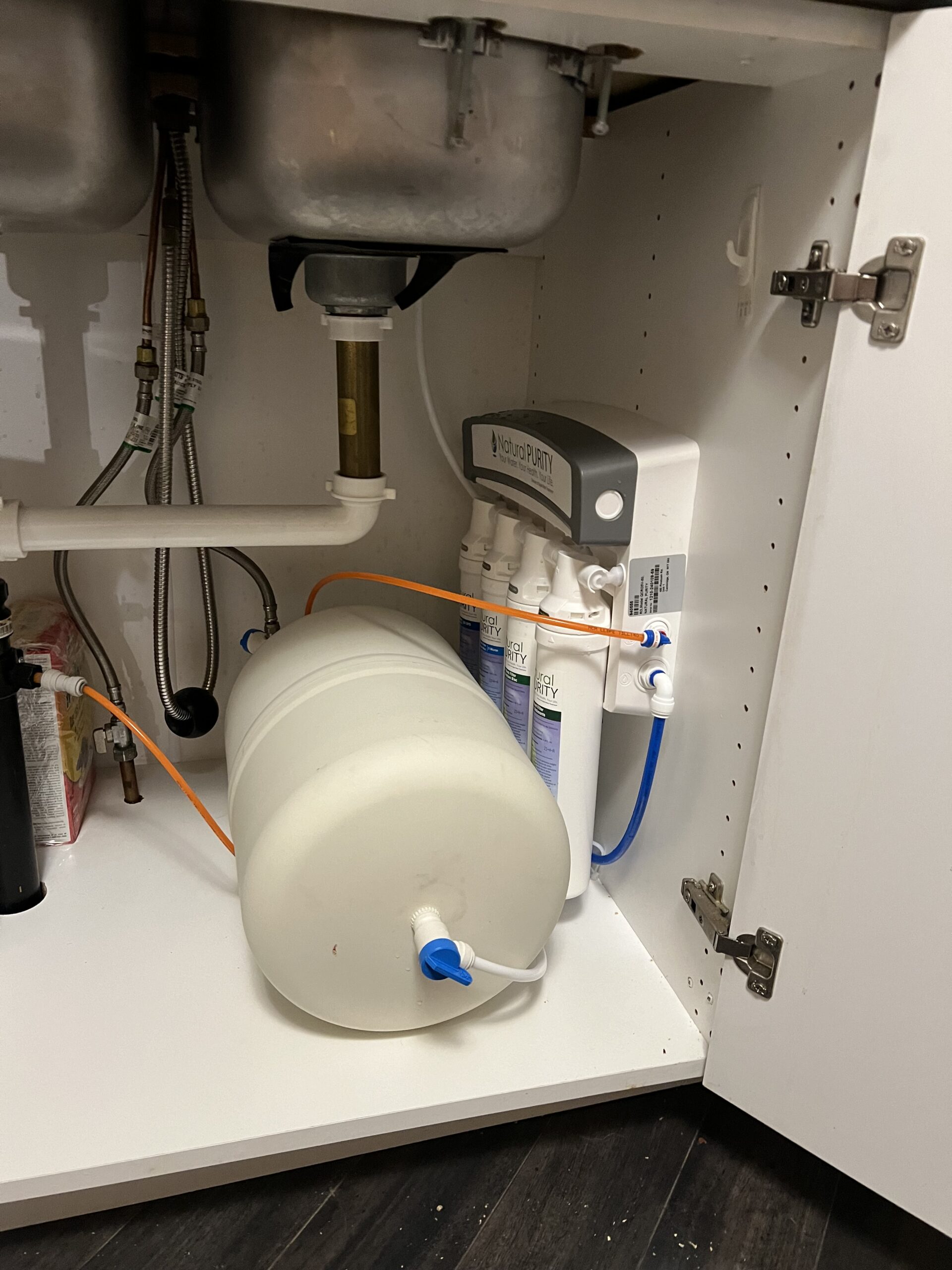 Water softener control valve programmed during commissioning in an Alberta home